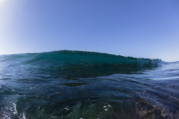 Fototapeta na wymiar Wave Blue Water Reef