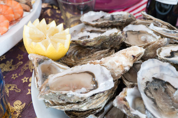 Fresh Oyster with Lemon  on plate