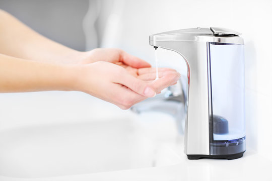 Hands And Automatic Soap Dispenser