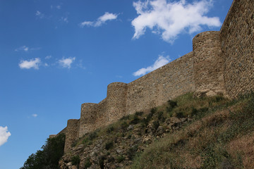 Fototapeta na wymiar Medieval wall around the Old city of Toledo, Spain.