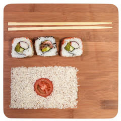 sushi and japan flag made with food on bamboo table