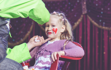 Girl Having Face Painted
