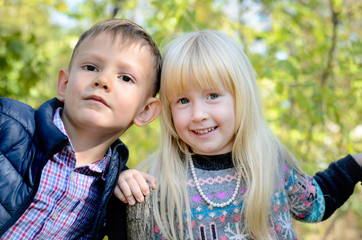 Portrait of Boy and Girl in Forest