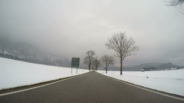 Driving with a on-board-camera in a winter landscape