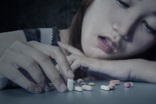 Teenage drug addict with medicine