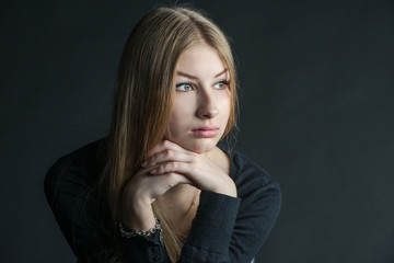Spiritual portrait of the Russian beautiful girl with long hair