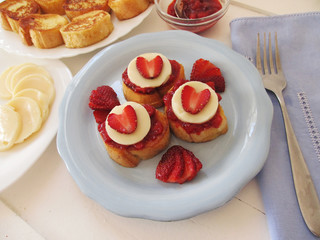 French toasts with jam and cream.