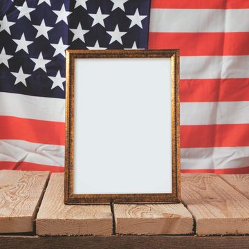 Memorial day background. Picture frame over USA flag