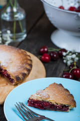traditional homemade cherry pie served on rustic table