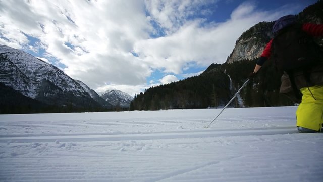 woman cross-country skiing 
