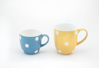 polka dot cup on white background
