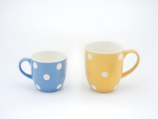 polka dot cup on white background