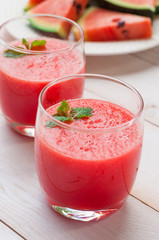 Fresh watermelon juice in the glass.Selective focus on the front