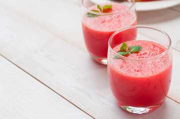 Fresh watermelon juice in the glass.Selective focus on the front