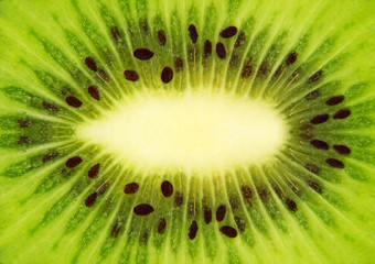 Fresh green kiwi taken closeup.Food background.