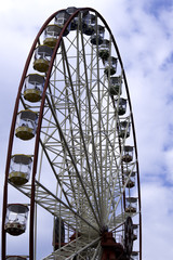Ferris wheel on the blue sky  background. Ukraine. Kharkiv