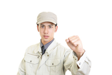 ガッツポーズの作業員