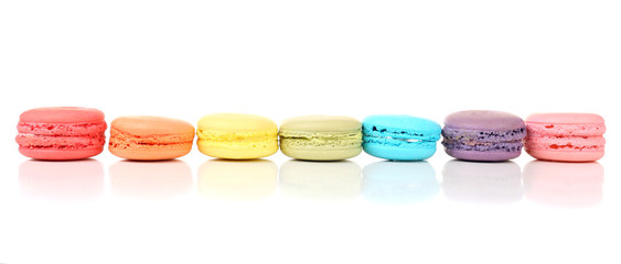 Tasty colorful macaroons isolated on white