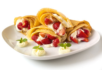 pancakes with strawberry, whipped cream and mint