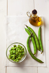 raw broad beans end olive oil