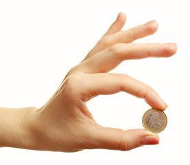 Plakat Female hand with coin isolated on white