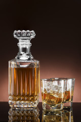 Glass and luxury bottle of liquor