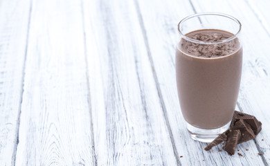 Chocolate Milk (on wooden background)