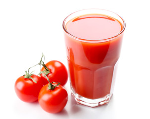 Glass of tomato juice with vegetables isolated on white