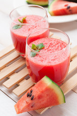 Fresh watermelon juice in the glass.Selective focus on the front