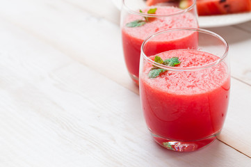 Fresh watermelon juice in the glass.Selective focus on the front