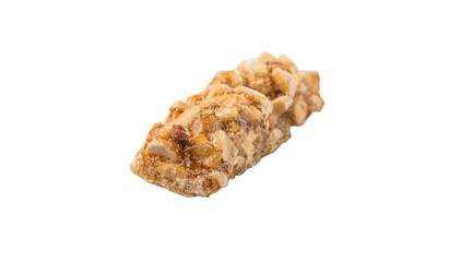 Caramelized candy nuts over white background 