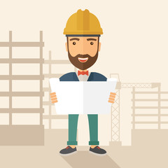 Construction worker holding the plan.