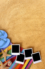 Polaroid style photo frame print in a line row on a summer beach sand background with towel star fish and sea shell holiday vacation memories vertical