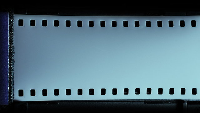 35mm camera inside, film, is rewound on each shot.