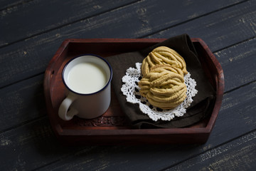 homemade cookies and milk in a vintage tray