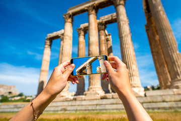 Photographing Greek temple ruins with mobile phone