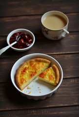 tart with cheese in the baking dish 