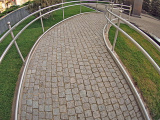 Ramp for physically challenged from the granite pavement