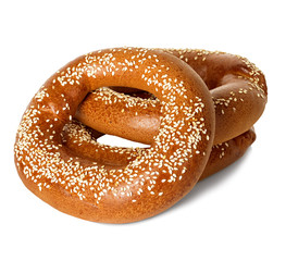 Bagels with sesame seeds isolated on white background