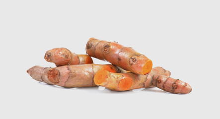 Fresh turmeric on white background
