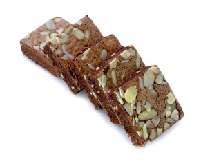 chocolate cake with almonds on white isolated background