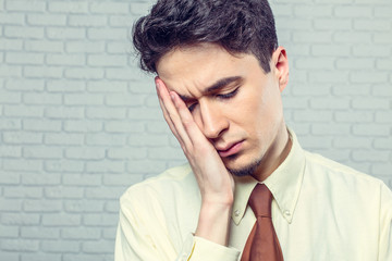 Young tired businessman