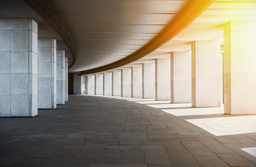 long corridor with columns at sunset