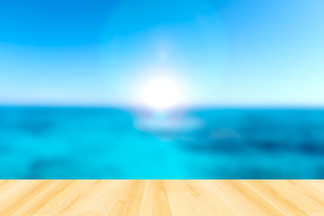 Wooden paving and blurred sea and sky background