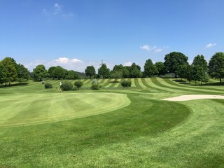 Golf field landscape with blue sky