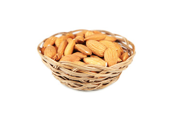 Almonds in basket isolated on white
