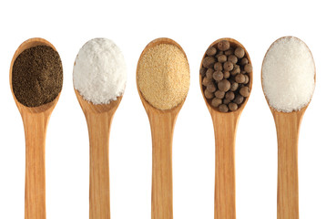 Spoon with spices on a white background. Collection