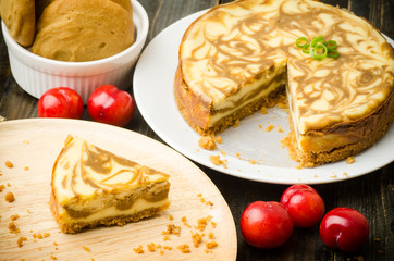 Coffee Marble Cheesecake on wooden background