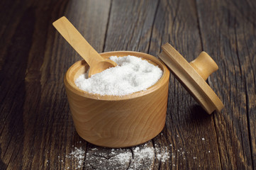 Salt in wooden bowl