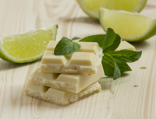 White chocolate with mint and lime, selective focus
